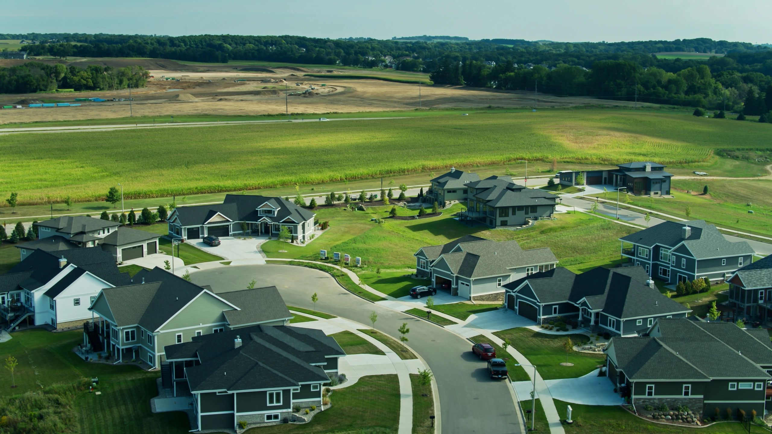 Aerial view of a suburban neighborhood and homes
