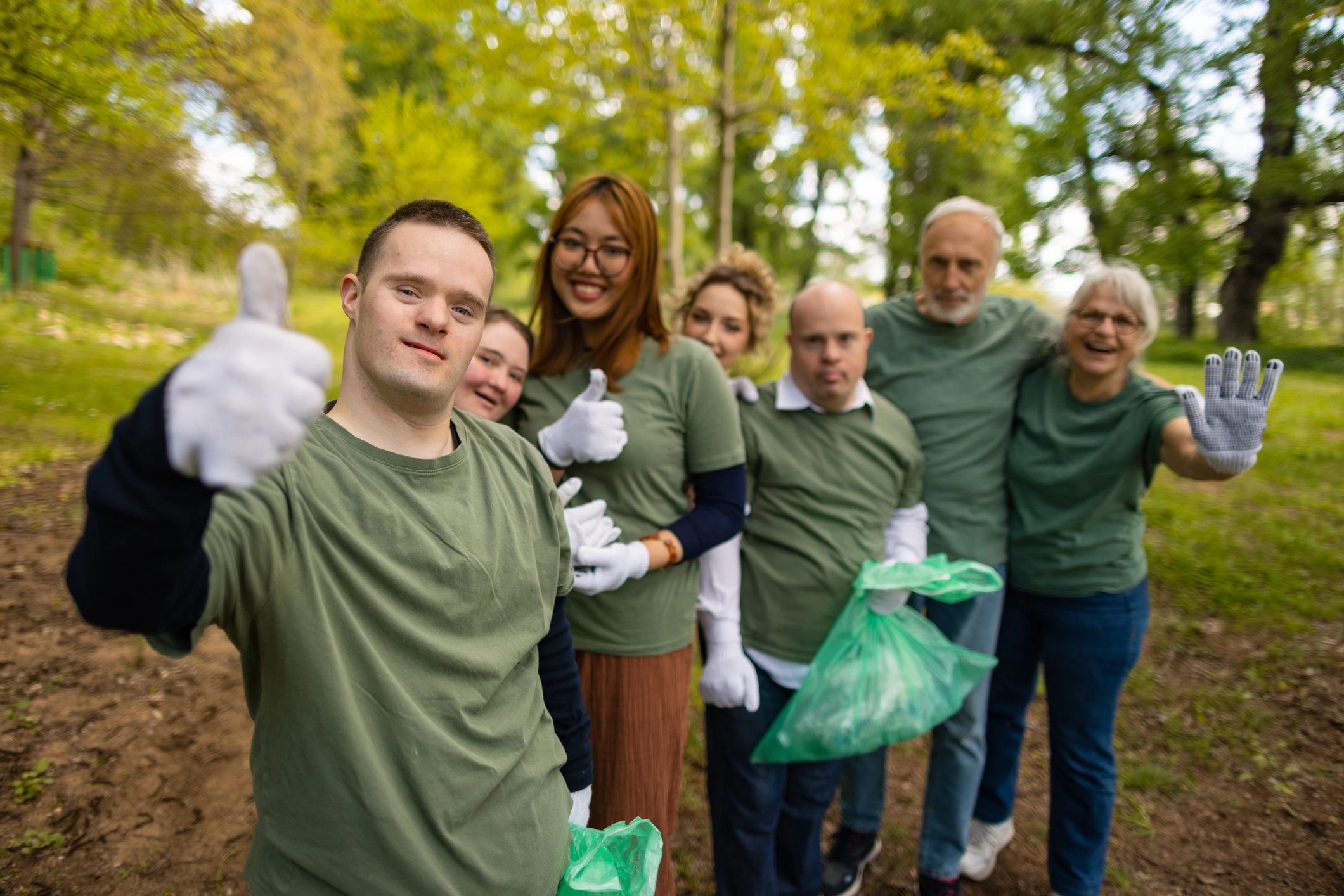 Group of volunteers outdoors supporting environmental conservation