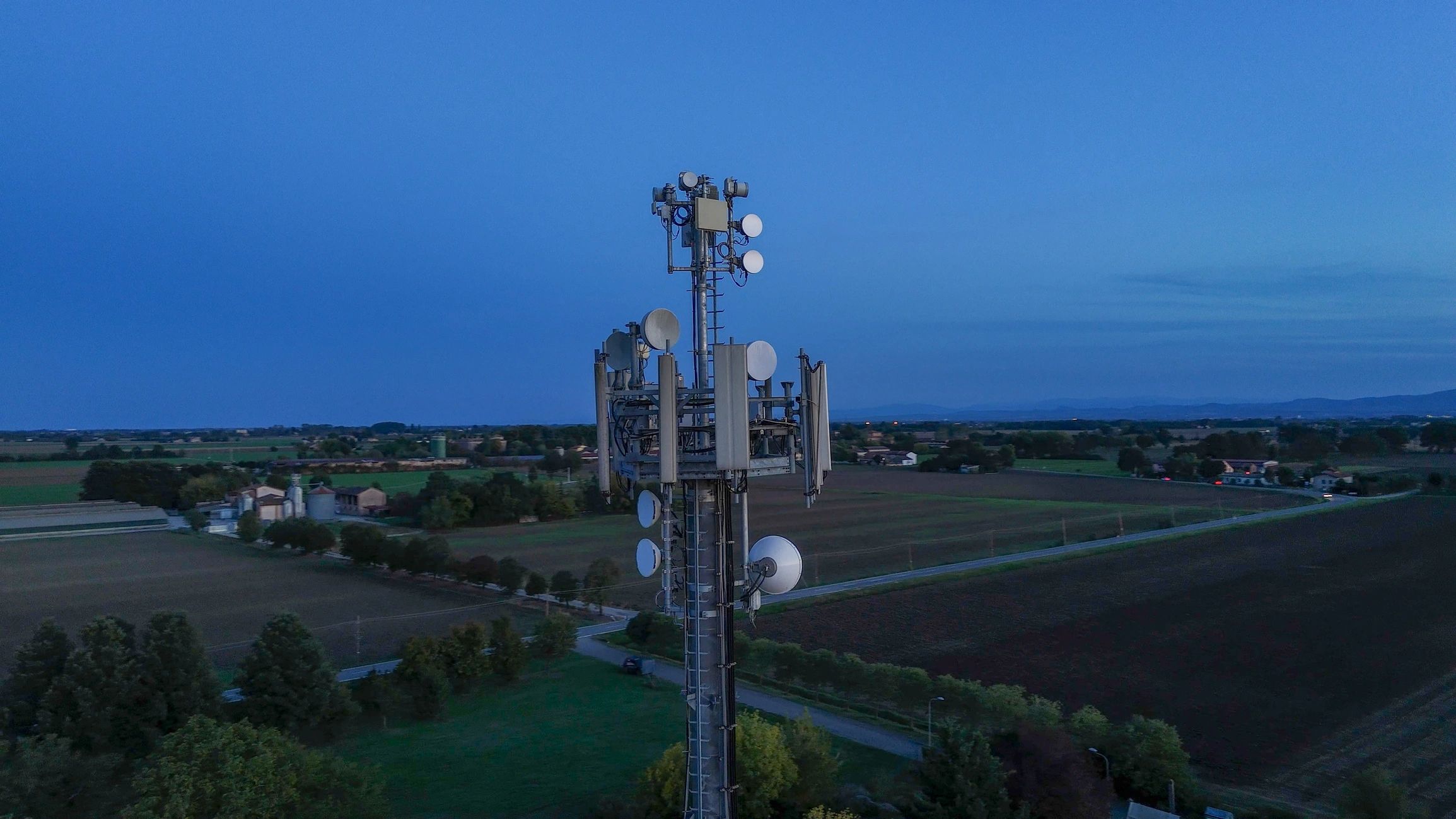 Telecom tower at twilight for inspection documentation